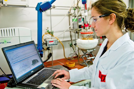 Sample Image Alt Text: Technical scientist uses laptop